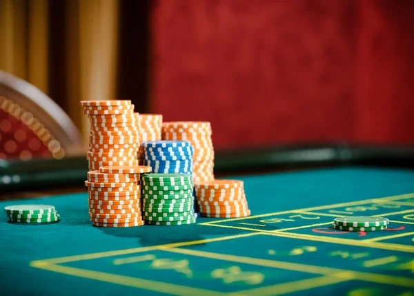 Live dealer studio table with roulette and dealer interface
